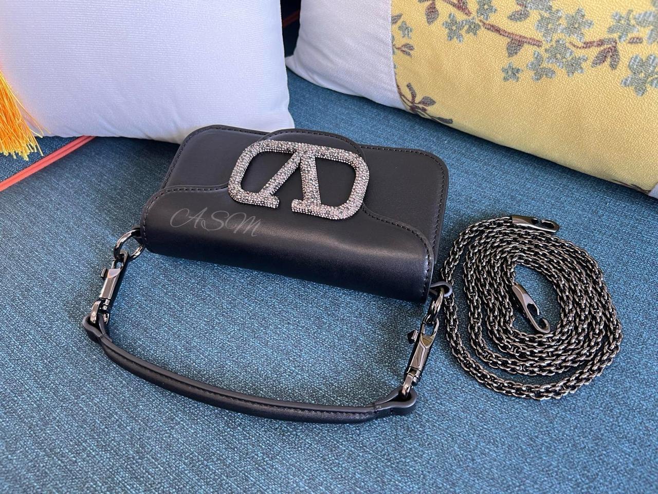 Valentino Garavani Locò Small Shoulder Bag with Jewel Logo.