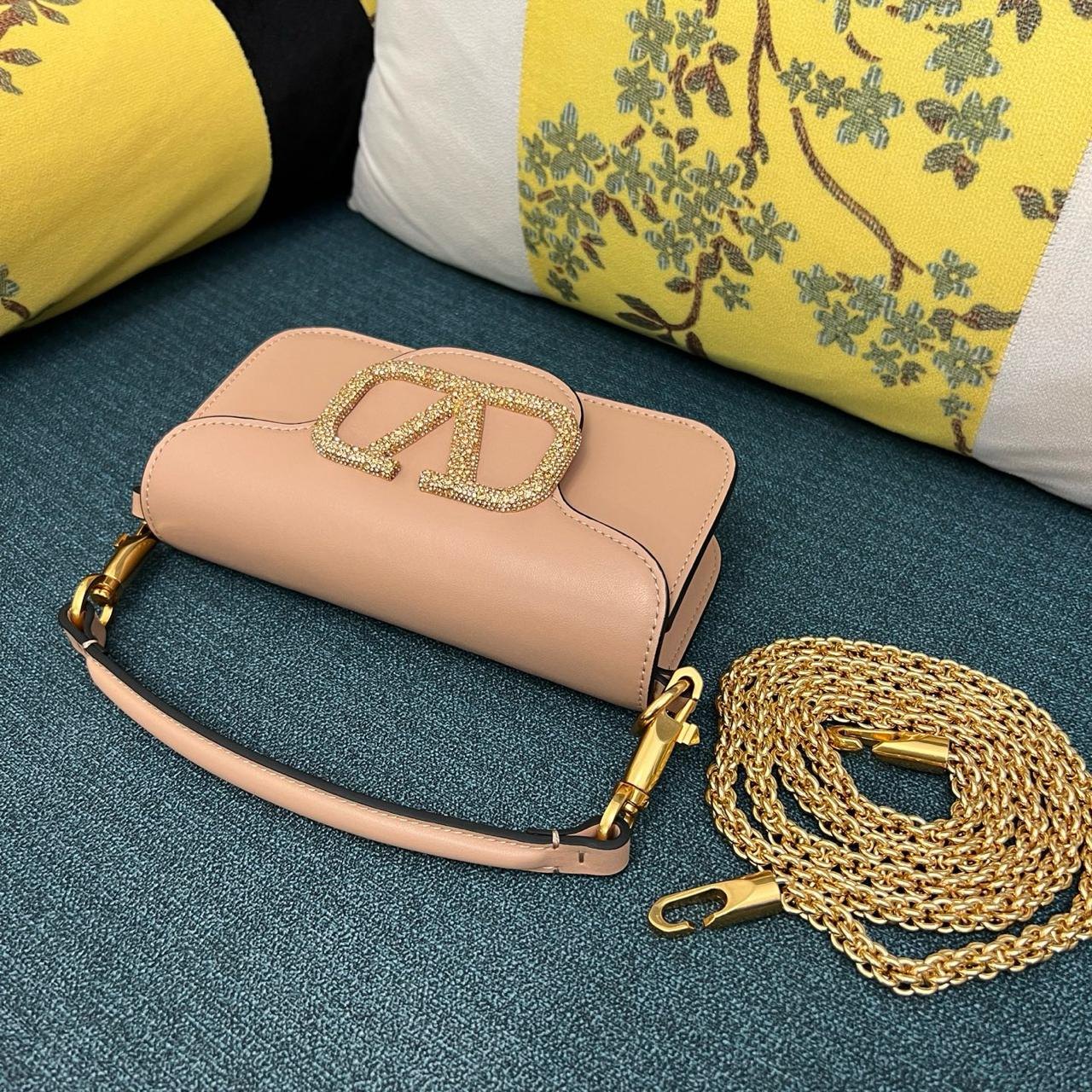 Valentino Garavani Locò Bag with Jewel Logo.