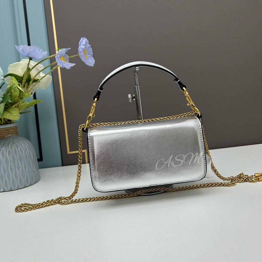 Valentino Garavani Locò Small Shoulder Bag.