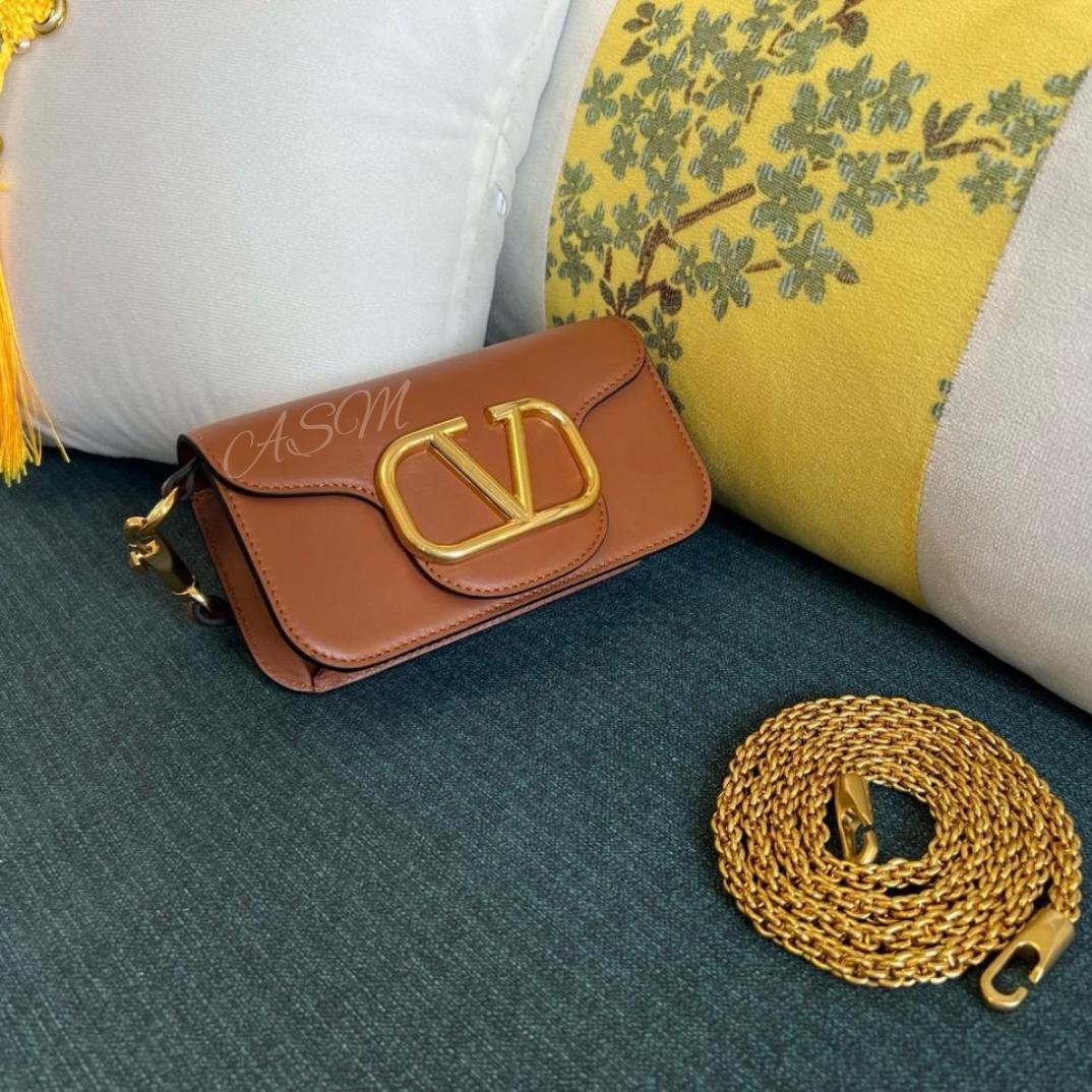 Valentino Garavani Locò Small Shoulder Bag.
