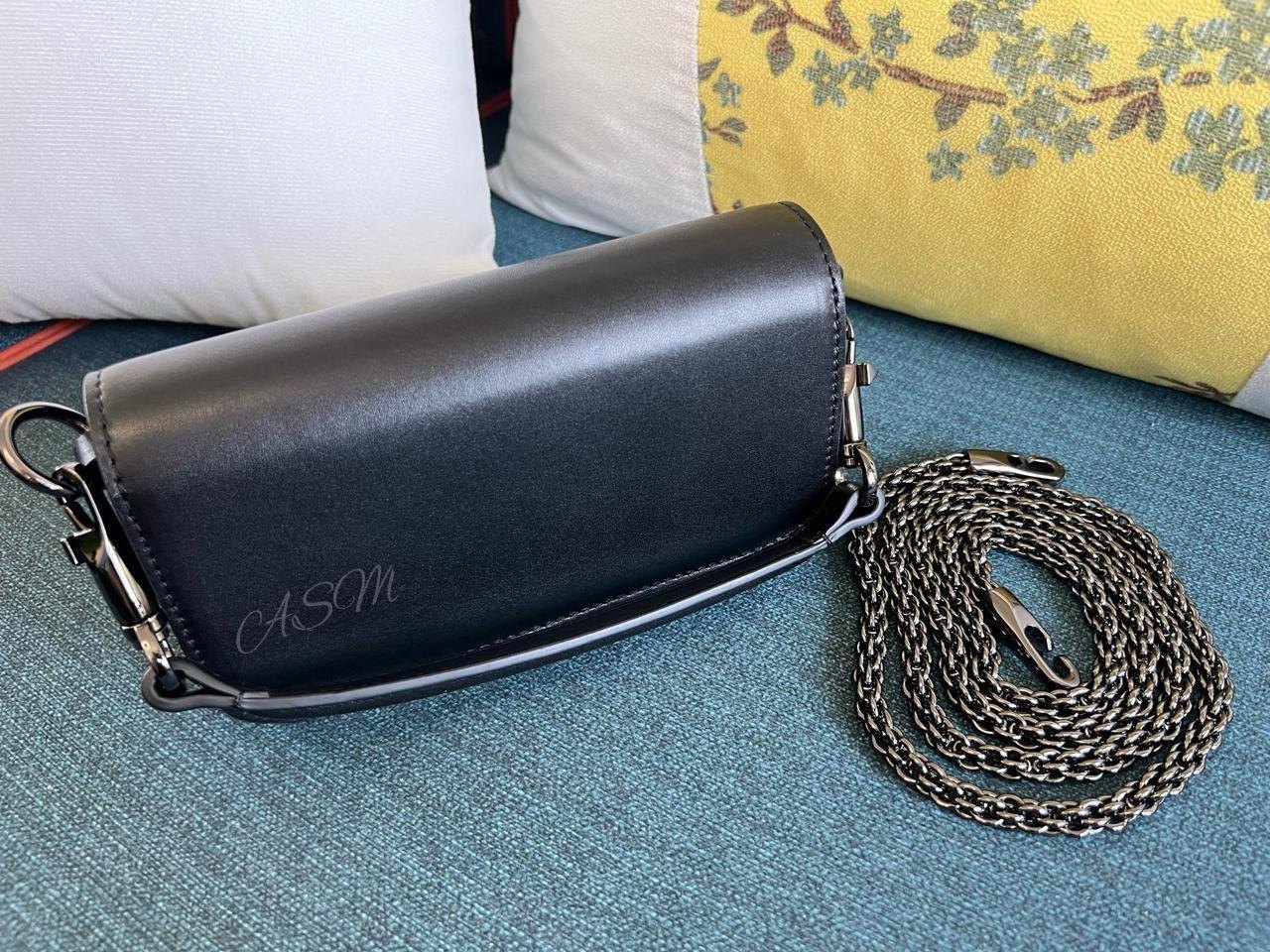 Valentino Garavani Locò Small Shoulder Bag with Jewel Logo.