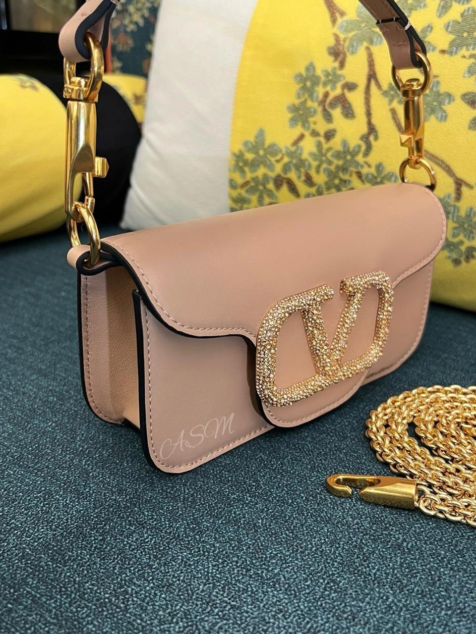 Valentino Garavani Locò Bag with Jewel Logo.
