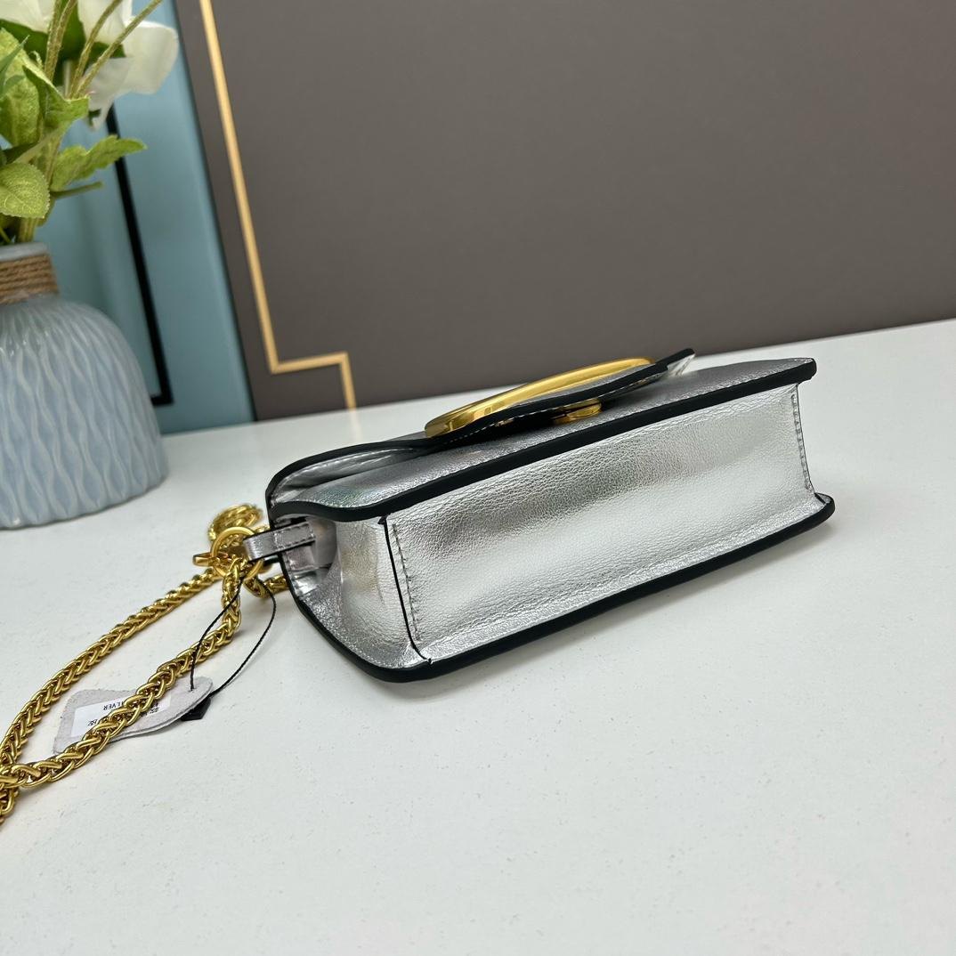 Valentino Garavani Locò Small Shoulder Bag.