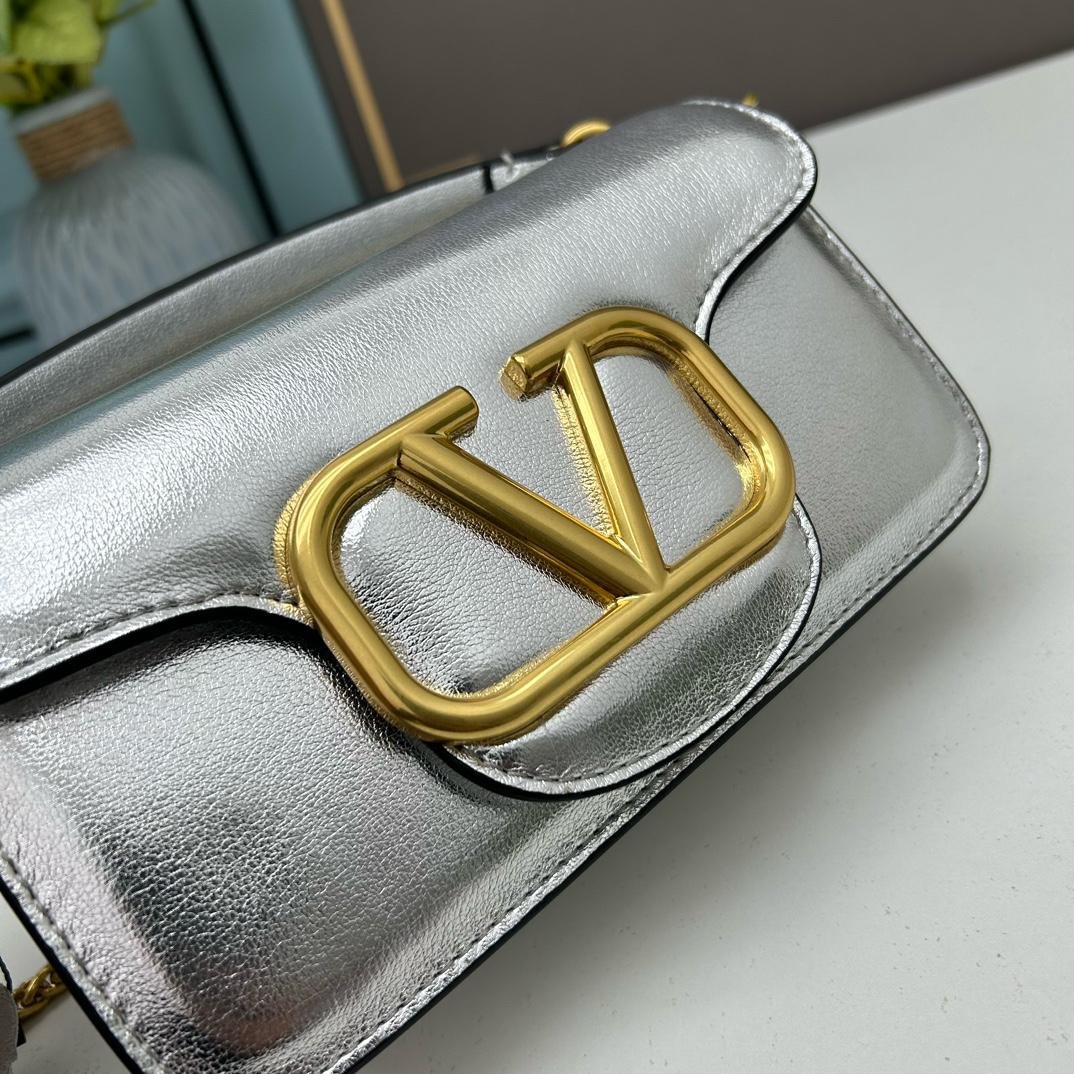 Valentino Garavani Locò Small Shoulder Bag.