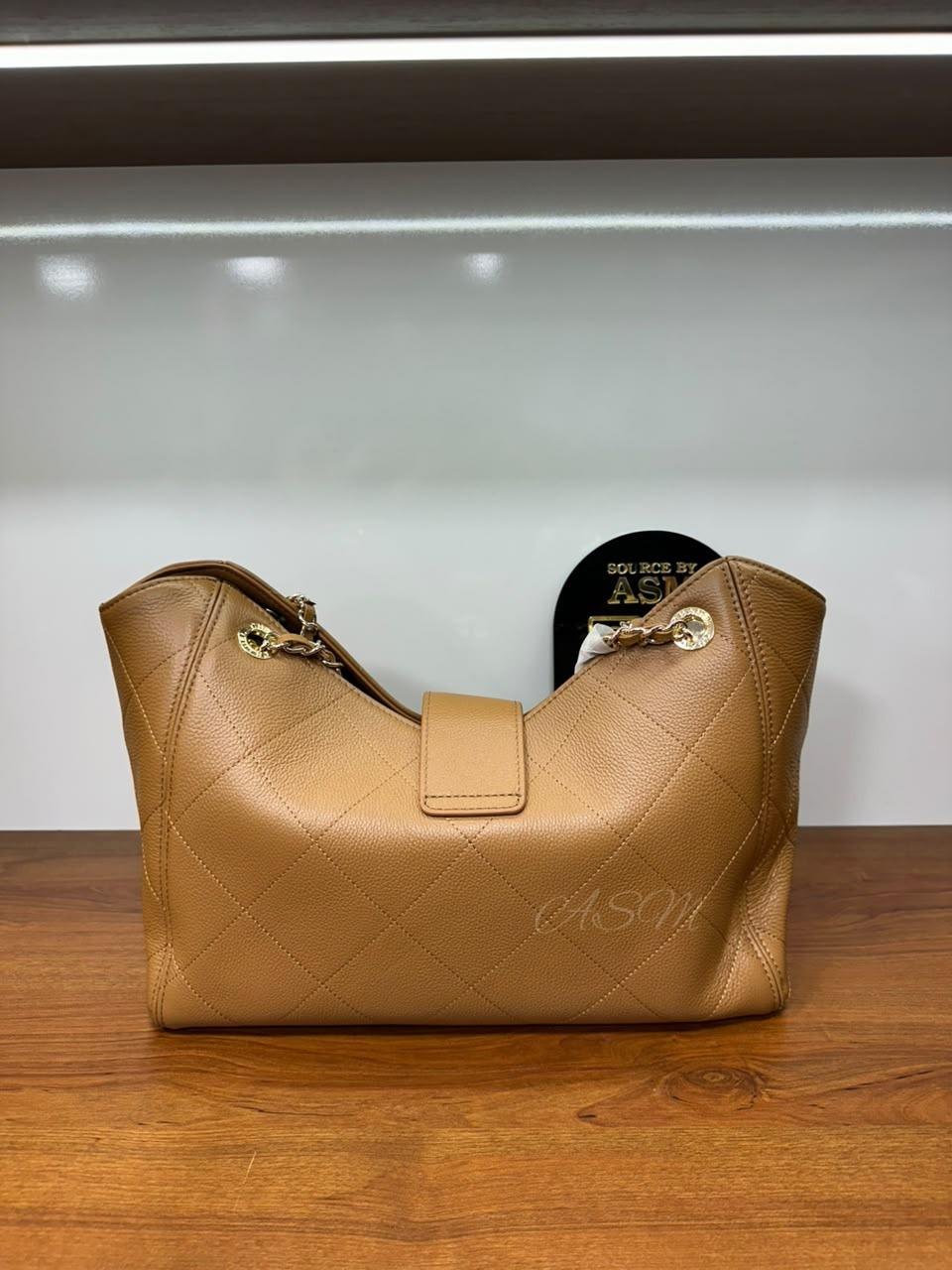 Chanel Maxi Shopping Bag