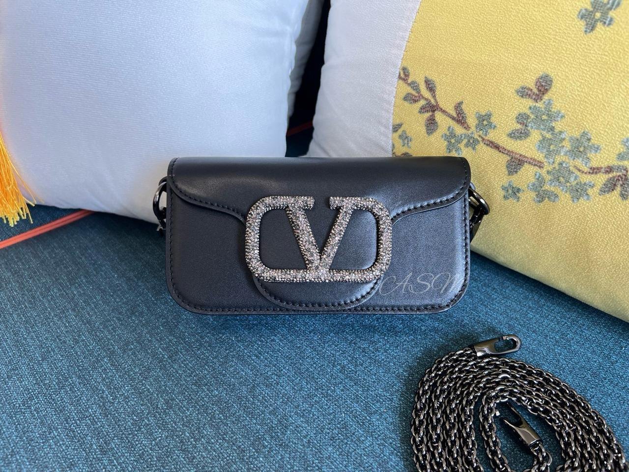Valentino Garavani Locò Small Shoulder Bag with Jewel Logo.