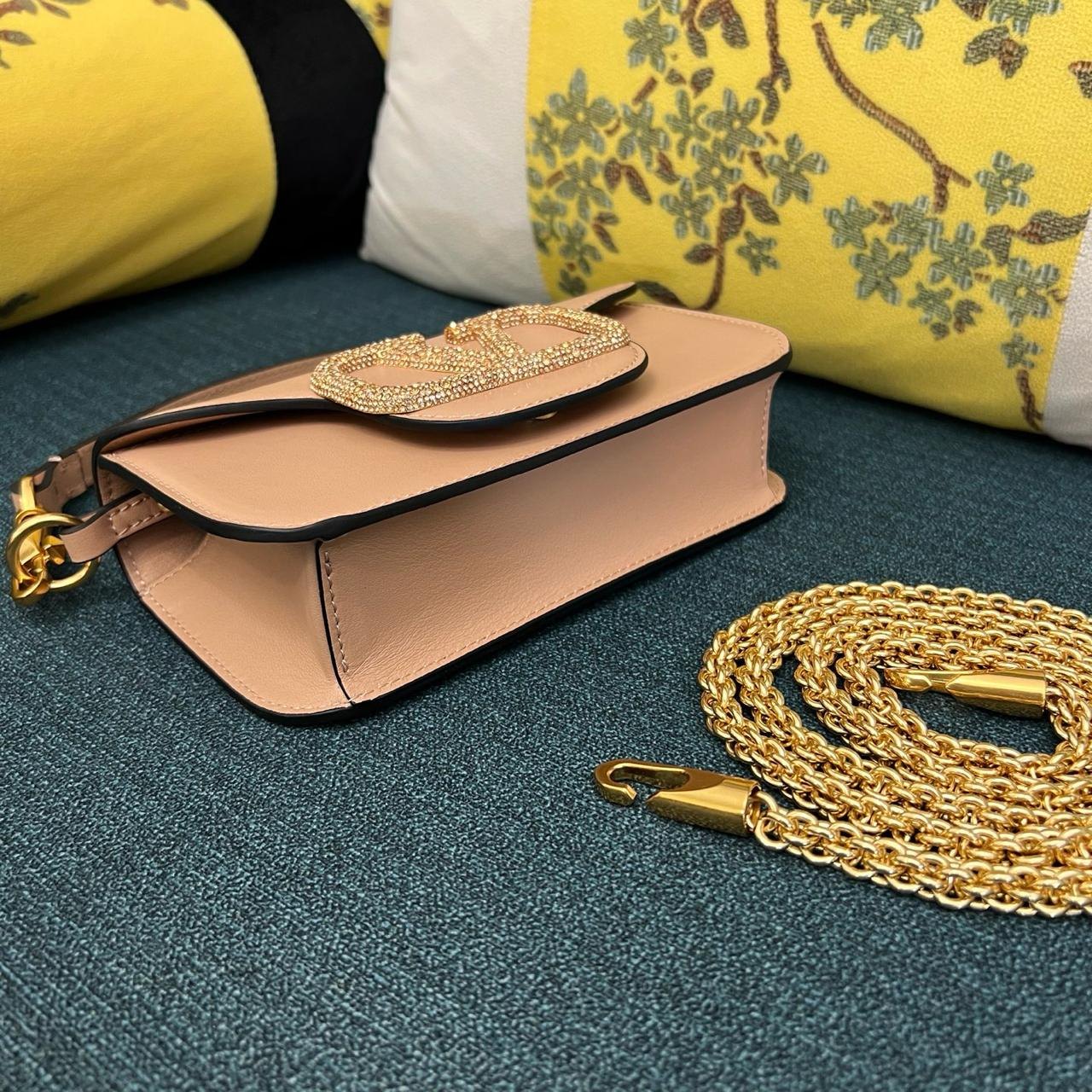 Valentino Garavani Locò Bag with Jewel Logo.