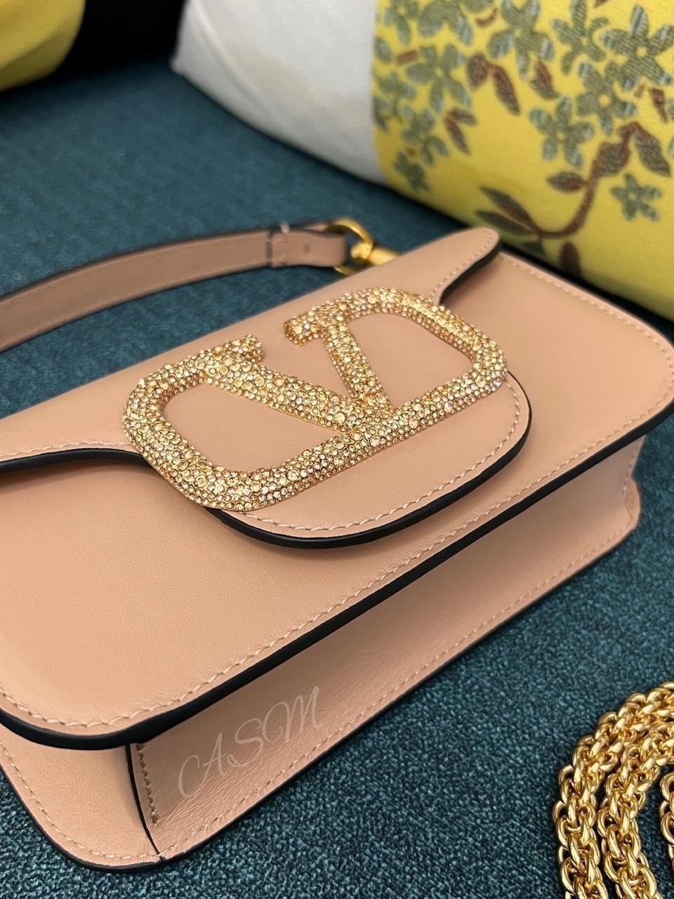 Valentino Garavani Locò Bag with Jewel Logo.