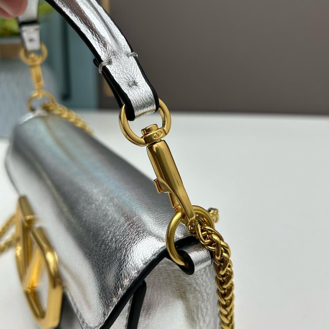 Valentino Garavani Locò Small Shoulder Bag.