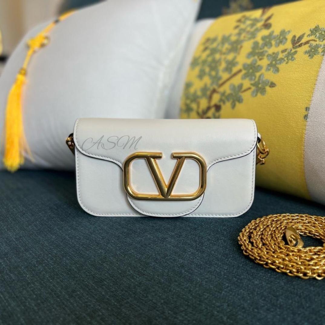 Valentino Garavani Locò Small Shoulder Bag.