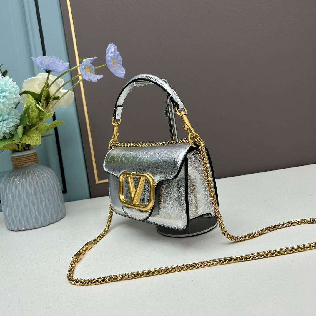 Valentino Garavani Locò Small Shoulder Bag.
